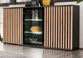 Sideboard Morgan in schwarz und Jackson Eiche Kommode mit 3D-Lamellen inkl. LED Sideboard Morgan in schwarz und Jackson Eiche Kommode mit 3D-Lamellen inkl. LED